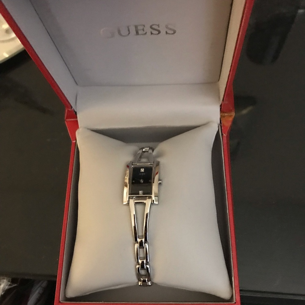 Silver with black face Guess ladies watch